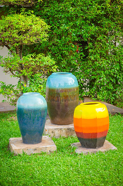istock colorful ceramic jars in garden 527798025