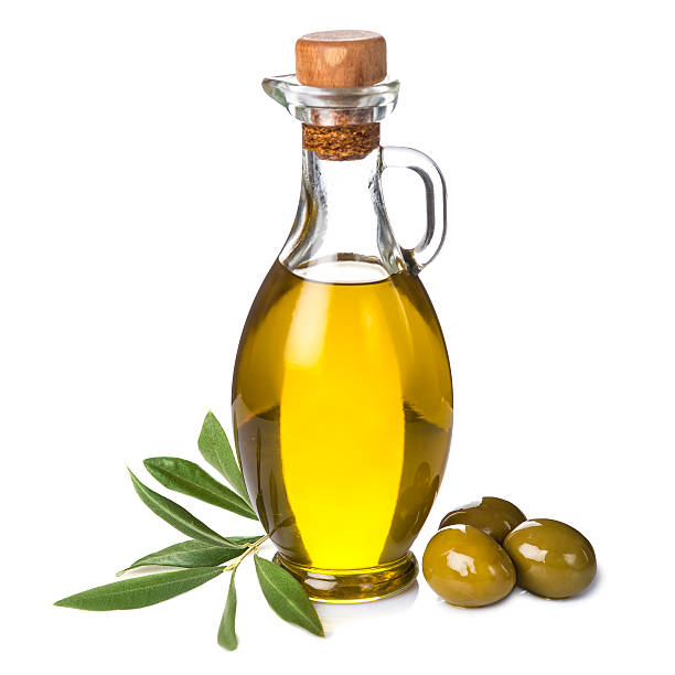 istock Extra olive oil bottle and green olives on white background 527798985