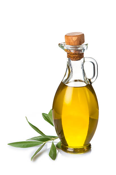 istock Bottle with olive oil isolated on white background 527799103