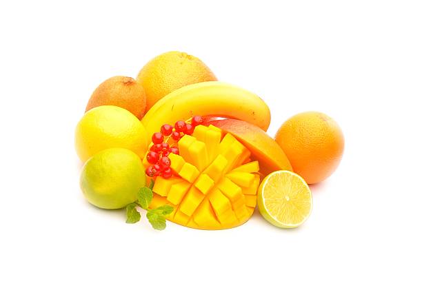 Slice of mango, lime and other fruits on white background