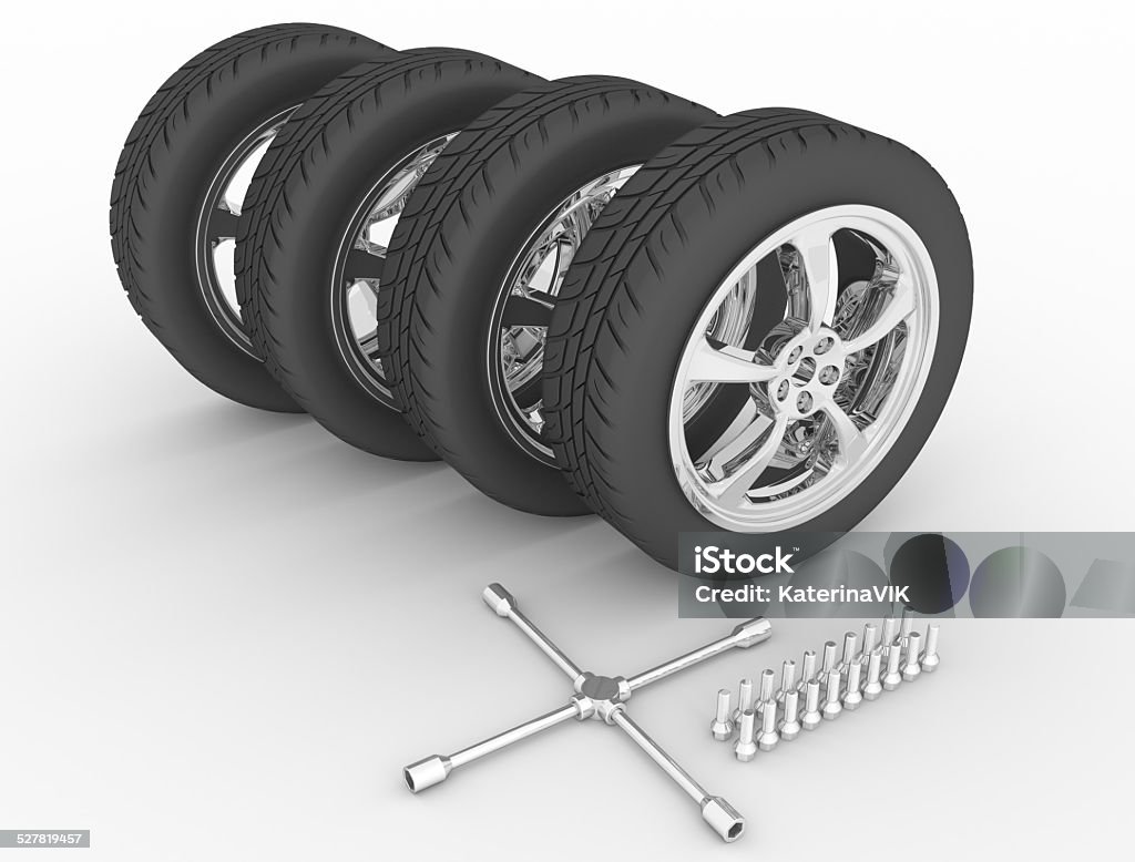 Car wheels Car wheels with key and bolts on white background Aluminum Stock Photo