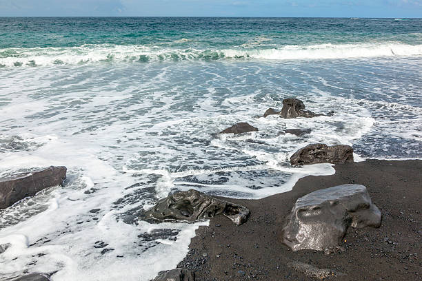 istock black wild volcanic beach in Lanzarote, Janubio. 527837407
