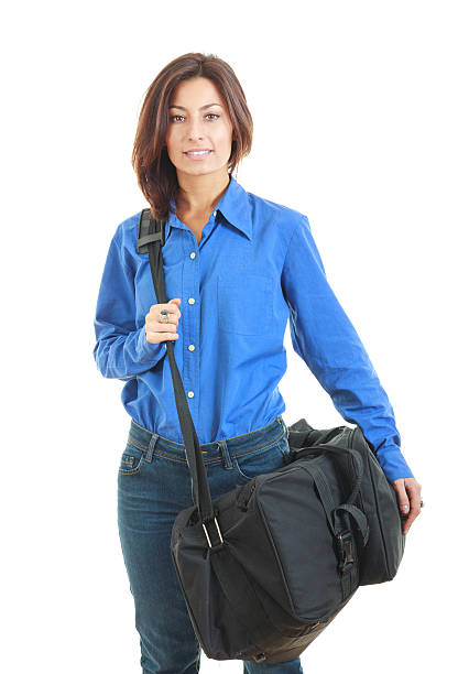 istock Business woman carrying a suitcase 527838271