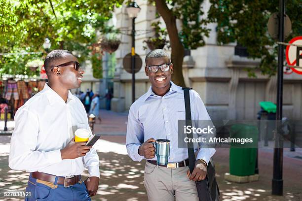 African Men Having Coffee And Conversation On Their Break Stock Photo - Download Image Now