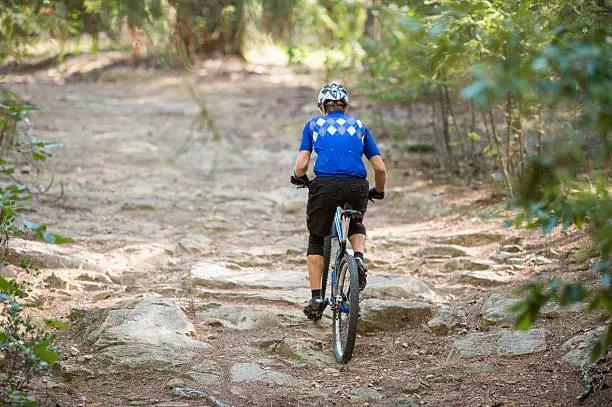 A man riding mountain-bike in a mountain