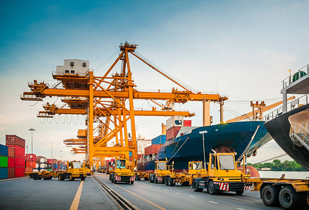 istock Container ship in the harbor in Asia , 527839389