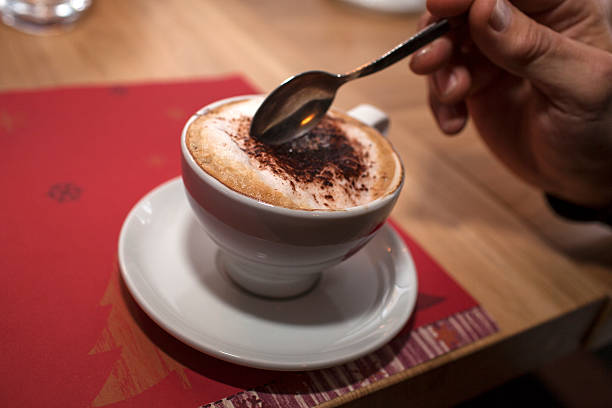 istock Cup of coffee on red napkin 527841545