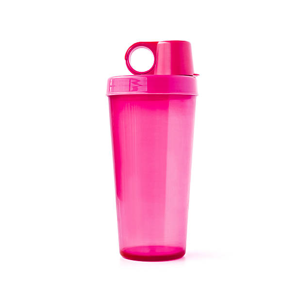 istock Pink plastic tumbler with cover 527843171