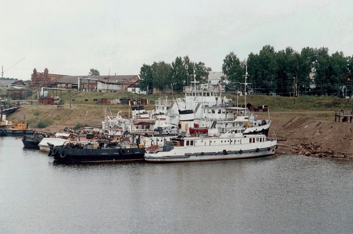 River ships in port, retro photo