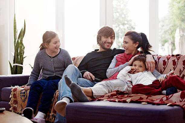istock Turkish family watching tv 527857151