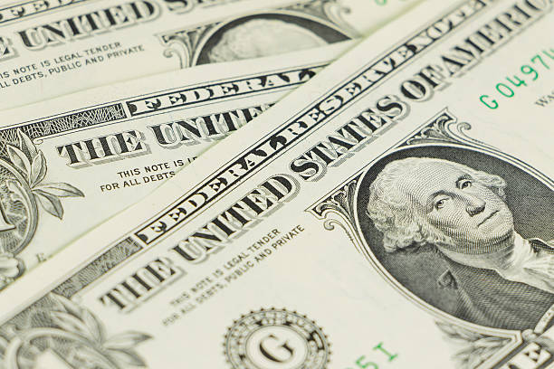 istock Close-up of one dollar on background 527858009