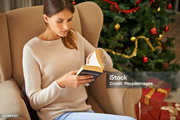 Cant Put A Good Book Down Stock Photo - Download Image Now - Adult, Adults Only, Armchair