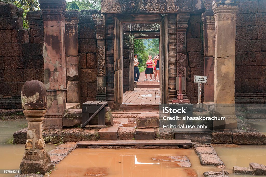 Banteay Srei  the cambodia temple Siem Reap,Cambodia - October 03,2009 : Tourists visiting the Banteay Srei temple on flood situation in Siem Reap,Cambodia.Banteay Srei or Banteay Srey is a 10th century Cambodian temple dedicated to the Hindu god Shiva. Ancient Stock Photo