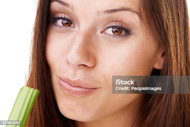 Chewing On Some Celery Stock Photo - Download Image Now - Eating, Protein Bar, Young Women