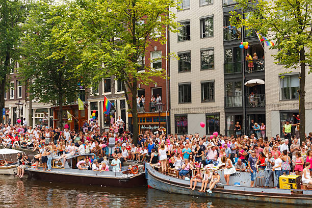 amsterdam gay pride 2014 - city amsterdam urban scene gay parade foto e immagini stock