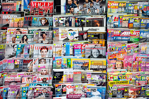 Athens, Greece - December 07, 2014 Stack of magazines for women on a newsstand at Athens Omonoia Square, Numero L'oficiell Marie claire Vogue Elle