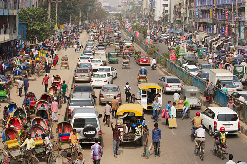 Dhaka, Bangladesh - February 22, 2014: Busy traffic at the central part of the city on February 22, 2014 in Dhaka, Bangladesh. Dhaka is one of the most overpopulated cities in the world. 
