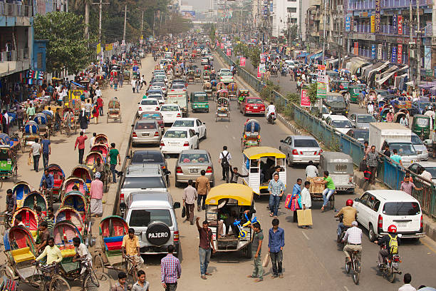 Busy traffic at the central part of the city, Dhaka, Bangladesh Dhaka, Bangladesh - February 22, 2014: Busy traffic at the central part of the city on February 22, 2014 in Dhaka, Bangladesh. Dhaka is one of the most overpopulated cities in the world.  bangladesh photos stock pictures, royalty-free photos & images