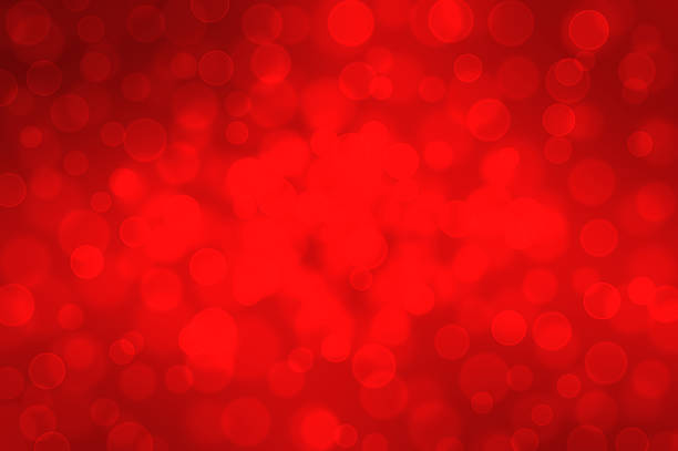 istock Red bokeh on a dark background Christmas 527876823