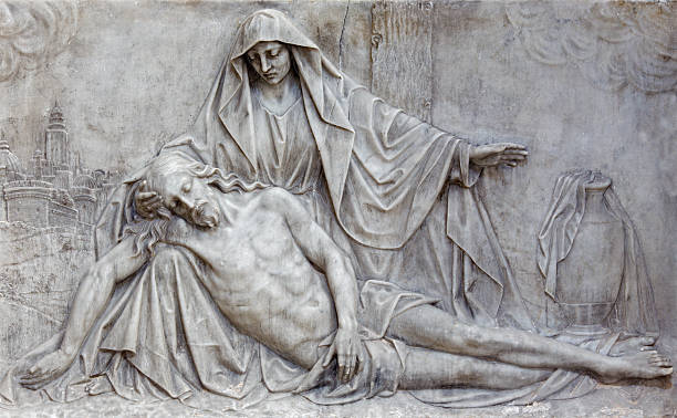 Brussels - The marble relief of Pieta Brussels - The marble relief of Pieta in church Notre Dame aux Riches Claires from end of 19. cent. pieta stock pictures, royalty-free photos & images