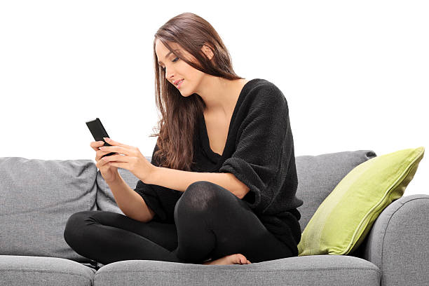 istock Young woman playing on her cell phone 527877711
