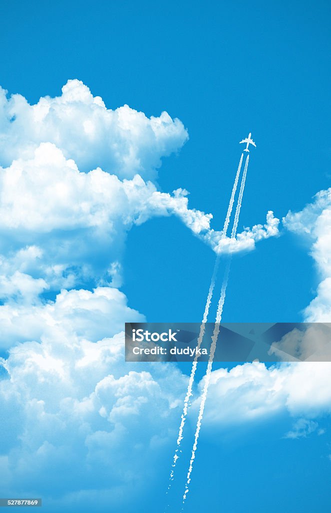 Airplane fly over a heart on the sky Airplane fly over a heart on the sky, love concept Airplane Stock Photo