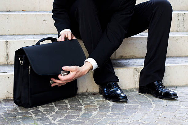 istock The business man open the bag 527877915