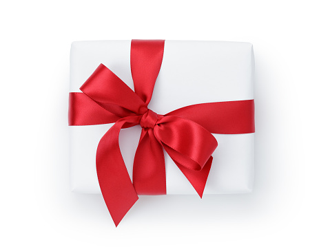 white gift box with ribbon bow from above, white background