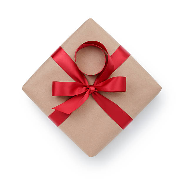 istock kraft paper gift box with ribbon bow from above 527879337