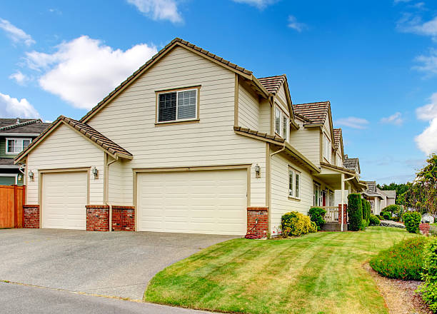 istock Large house with garage and driveway. 527879971