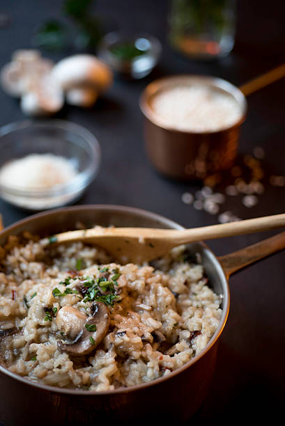 istock Mushroom and Sun-dried Tomato Risotto in a Copper Saucepan 527880705