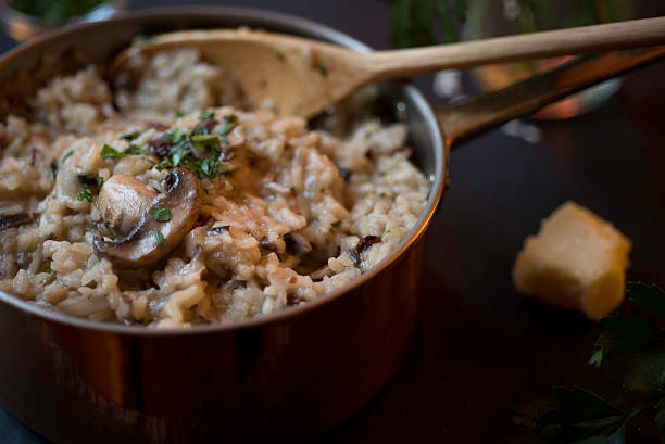 istock Mushroom and Sun-dried Tomato Risotto in a Copper Saucepan 527880707