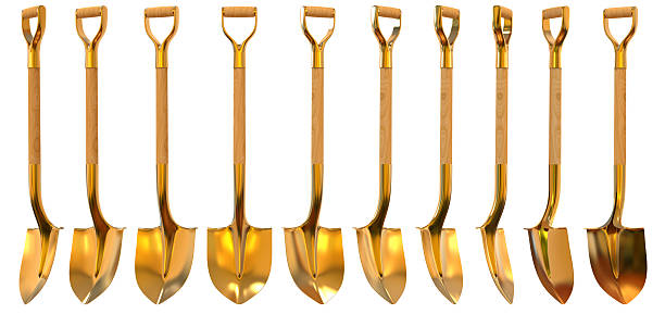 Golden shovel set foreshortening 3d illustration Golden shovel set foreshortening  isolated on white background dibs stock pictures, royalty-free photos & images