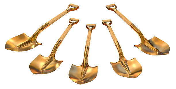 istock Golden shovel set foreshortening 3d illustration 527890748