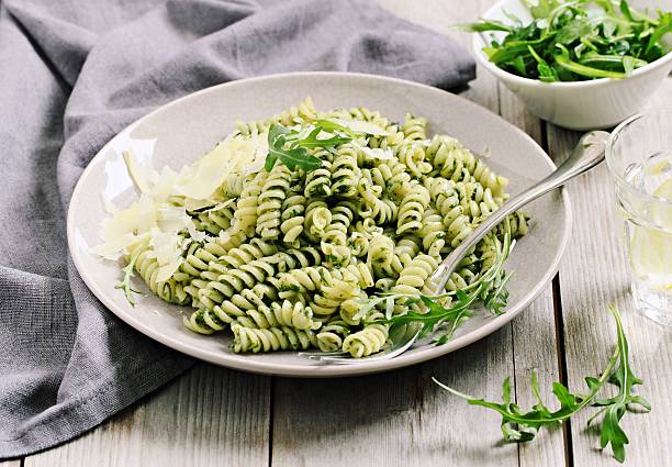 istock Pasta with pesto ,arugula and parmesan 527894798