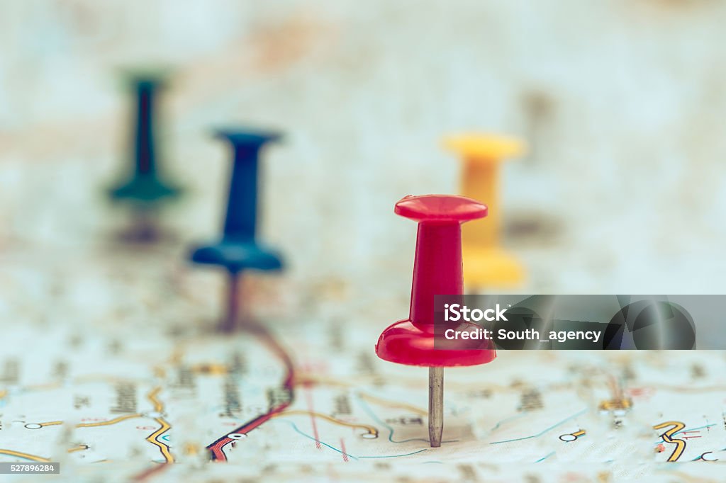 Plan For Travelling horizontal shot of colorful pins marking different traveling locations on map. Road Map Stock Photo
