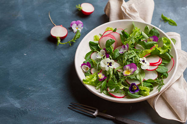 istock Spring salad with edible flower 527896902