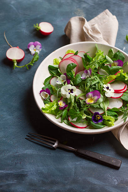 istock Spring salad with edible flower 527897288