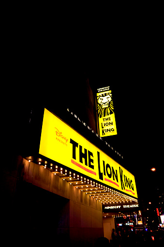 New York, NY, USA - October 25, 2014: THE Lion King: The Lion King is a musical based on the 1994 Disney animated film of the same name with music by Elton John and lyrics by Tim Rice along with the musical score created by Hans Zimmer with choral arrangements by Lebo M. Directed by Julie Taymor, the musical features actors in animal costumes as well as giant, hollow puppets. The show is produced by Disney Theatrical Productions.