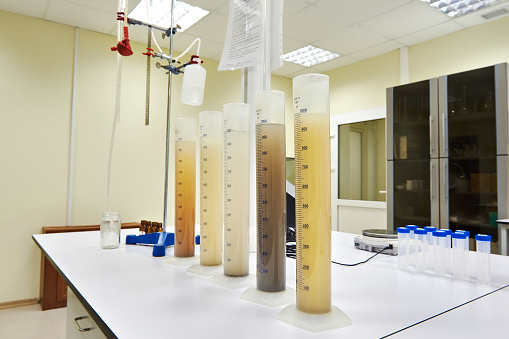 Measuring test tubes with different liquid for experiences