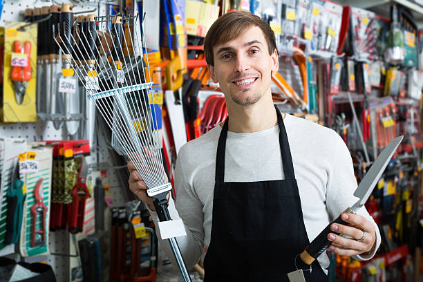 istock seller smiling at gardening section 527899748