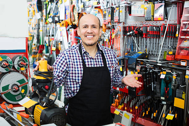 istock Seller posing near electric compressor 527899924