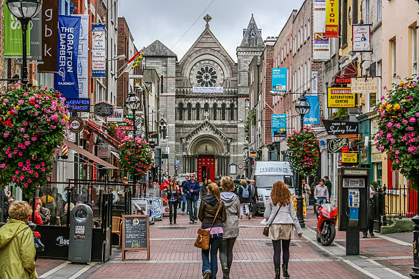 Dublin's Grafton Street Shoppers on Grafton Street. Dublin, Ireland dublin republic of ireland stock pictures, royalty-free photos & images