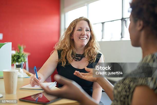 Unposed Group Of Creative Business People In An Open Concept Stock Photo - Download Image Now