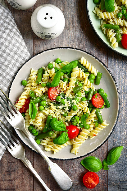 istock Pasta primavera on a vintage plates. 527904750