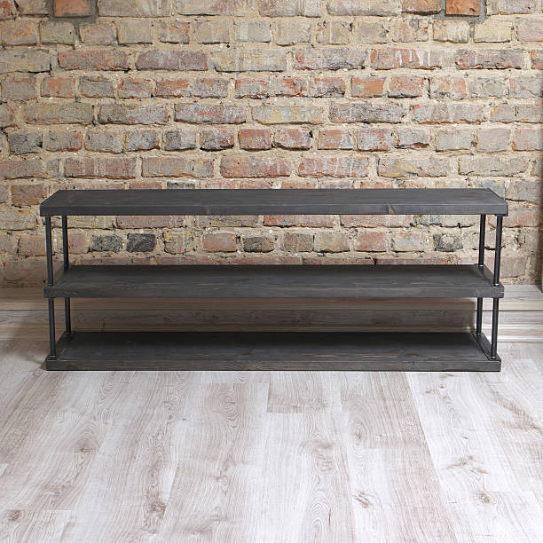 istock modern wooden shoe rack in the loft interior 527906444