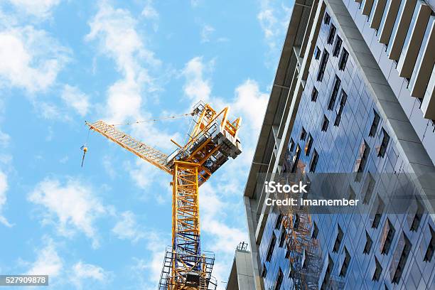 Tower Crane At Construction Site Of Skyscraper Copy Space Stock Photo - Download Image Now