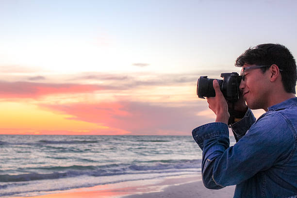 istock Photographer at dusk 527910190