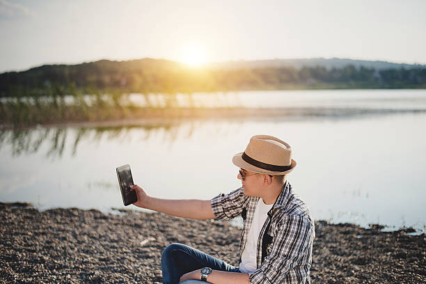 istock Young man with phone 527911480