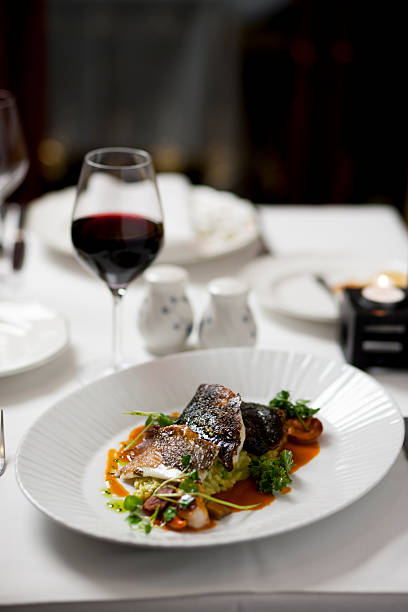 istock magallanica hake with parsley and garlic sauce (fish) 527911862
